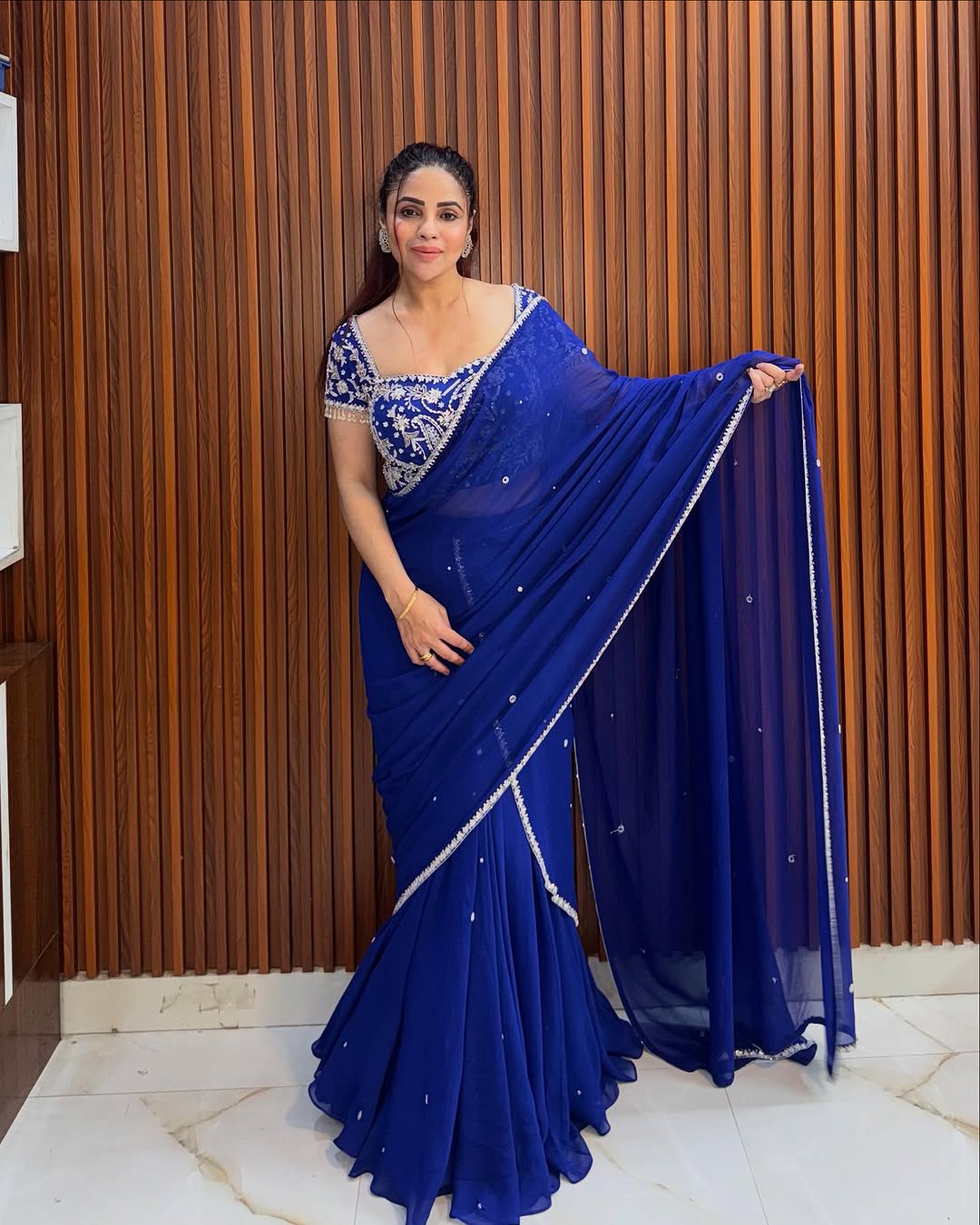 Glamorous Blue Embroidered Lehenga Saree